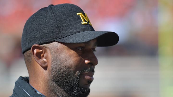 Oct 19, 2024; Champaign, Illinois, USA;  Michigan Wolverines head coach Sherrone Moore during the first half against the Illinois Fighting Illini at Memorial Stadium. Mandatory Credit: Ron Johnson-Imagn Images