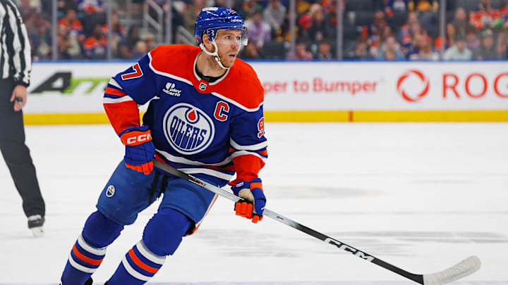 Sep 28, 2025; Edmonton, Alberta, CAN; Edmonton Oilers forward Connor McDavid (97) follows the play against the Vancouver Canucks at Rogers Place. Mandatory Credit: Perry Nelson-Imagn Images