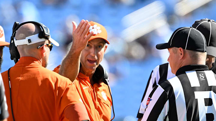 Oct 4, 2025; Chapel Hill, North Carolina, USA;  Clemson Tigers head coach Dabo Swinney talks with the referee in the fourth quarter at Kenan Stadium. Mandatory Credit: Bob Donnan-Imagn Images