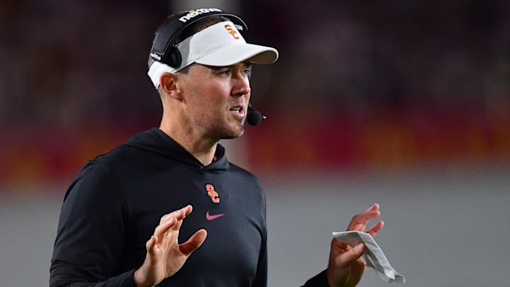 Oct 7, 2023; Los Angeles, California, USA; Southern California Trojans head coach Lincoln Riley watches game action against the Arizona Wildcats during the first half at Los Angeles Memorial Coliseum. Mandatory Credit: Gary A. Vasquez-Imagn Images
