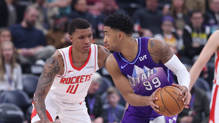 Feb 22, 2025; Salt Lake City, Utah, USA; Utah Jazz forward KJ Martin (99) looks for a play against Houston Rockets forward Jabari Smith Jr. (10) during the second half at Delta Center. Mandatory Credit: Rob Gray-Imagn Images Feb 22, 2025; Salt Lake City, Utah, USA; Utah Jazz forward KJ Martin (99) looks for a play against Houston Rockets forward Jabari Smith Jr. (10) during the second half at Delta Center. Mandatory Credit: Rob Gray-Imagn Images