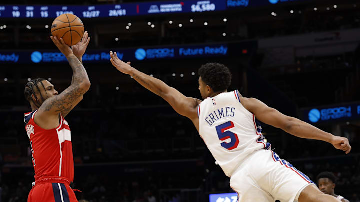 Oct 28, 2025; Washington, District of Columbia, USA; Washington Wizards forward Cam Whitmore (1) shoots the ball over Philadelphia 76ers guard Quentin Grimes (5) in the third quarter at Capital One Arena. Mandatory Credit: Geoff Burke-Imagn Images