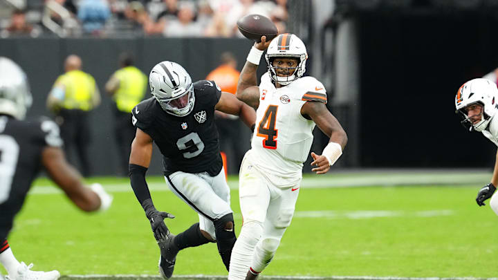 Sep 29, 2024; Paradise, Nevada, USA; Cleveland Browns quarterback Deshaun Watson (4) throws under pressure against Las Vegas Raiders defensive end Tyree Wilson (9) during the second quarter at Allegiant Stadium. Mandatory Credit: Stephen R. Sylvanie-Imagn Images Sep 29, 2024; Paradise, Nevada, USA; Cleveland Browns quarterback Deshaun Watson (4) throws under pressure against Las Vegas Raiders defensive end Tyree Wilson (9) during the second quarter at Allegiant Stadium. Mandatory Credit: Stephen R. Sylvanie-Imagn Images