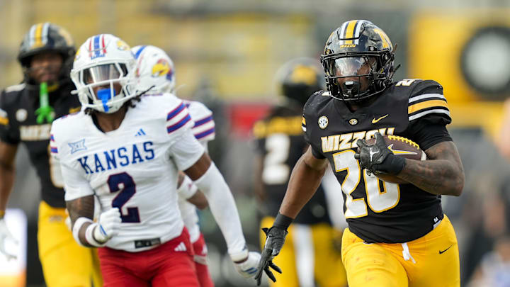 Sep 6, 2025; Columbia, Missouri, USA; Missouri Tigers running back Jamal Roberts (20) runs for a touchdown during the fourth quarter against the Kansas Jayhawks at Faurot Field at Memorial Stadium. Mandatory Credit: Jay Biggerstaff-Imagn Images