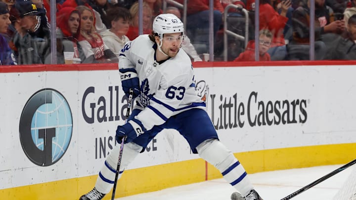 Dec 28, 2025; Detroit, Michigan, USA;  Toronto Maple Leafs left wing Matias MacCelli (63) skates with the puck in the third period against the Detroit Red Wings at Little Caesars Arena. Mandatory Credit: Rick Osentoski-Imagn Images