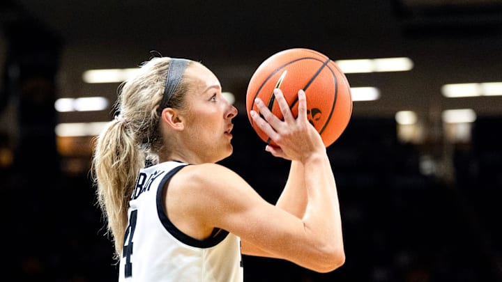Iowa guard Kylie Feuerbach (4) shoots a 3-pointer at the end of the first quarter against the Illinois Fighting Illini Feb. 26, 2026 at Carver-Hawkeye Arena in Iowa City, Iowa. Iowa guard Kylie Feuerbach (4) shoots a 3-pointer at the end of the first quarter against the Illinois Fighting Illini Feb. 26, 2026 at Carver-Hawkeye Arena in Iowa City, Iowa.
