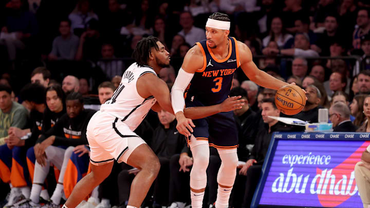 Nov 15, 2024; New York, New York, USA; New York Knicks guard Josh Hart (3) controls the ball against Brooklyn Nets guard Cam Thomas (24) during the first quarter at Madison Square Garden. Mandatory Credit: Brad Penner-Imagn Images