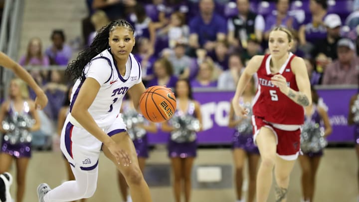 Taylor Bigby drives against Texas Tech. 