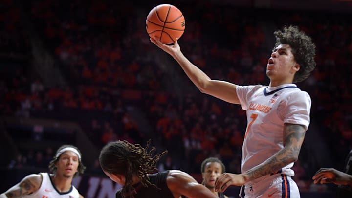 Nov 23, 2024; Champaign, Illinois, USA; Illinois Fighting Illini forward Will Riley (7) shoots the ball over Maryland-Eastern Shore Hawks forward Jalen Ware (24) during the first half at State Farm Center. Mandatory Credit: Ron Johnson-Imagn Images Nov 23, 2024; Champaign, Illinois, USA; Illinois Fighting Illini forward Will Riley (7) shoots the ball over Maryland-Eastern Shore Hawks forward Jalen Ware (24) during the first half at State Farm Center. Mandatory Credit: Ron Johnson-Imagn Images