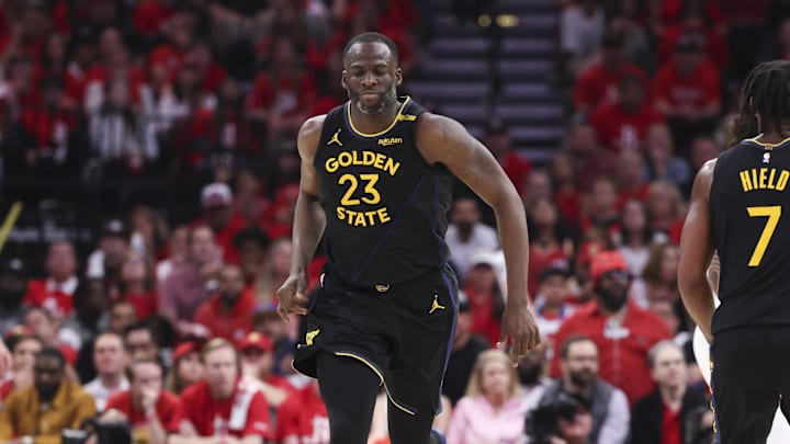May 4, 2025; Houston, Texas, USA; Golden State Warriors forward Draymond Green (23) reacts after scoring a basket during the third quarter of game seven of the first round for the 2025 NBA Playoffs against the Houston Rockets at Toyota Center. Mandatory Credit: Troy Taormina-Imagn Images