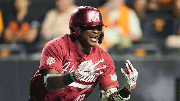 Alabama's Eric Hines (42) celebrates after hitting a 3-run home run against Tennessee in an NCAA college baseball game on April 23, 2026, in Knoxville, Tennessee.