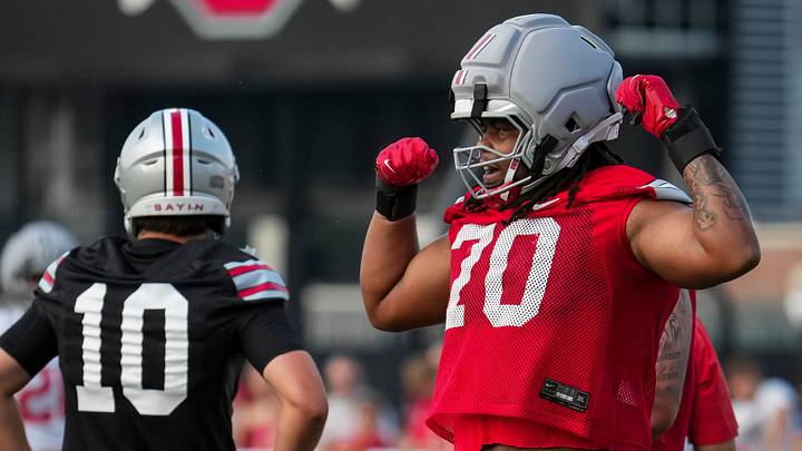 Ohio State Buckeyes offensive lineman Phillip Daniels (70) gestures during the first practice of training camp at the Woody Hayes Athletic Center in Columbus on Aug. 6, 2026. Ohio State Buckeyes offensive lineman Phillip Daniels (70) gestures during the first practice of training camp at the Woody Hayes Athletic Center in Columbus on Aug. 6, 2026.