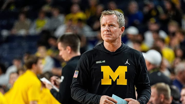 Michigan head coach Dusty May watches warm up before the season opener against Cleveland State during the first half at Crisler Center in Ann Arbor on Monday, Nov. 4, 2024.