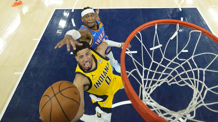 Jun 13, 2025; Indianapolis, Indiana, USA; Indiana Pacers guard Tyrese Haliburton (0) shoots the ball against Oklahoma City Thunder guard Shai Gilgeous-Alexander (2) during the second half during game four of the 2025 NBA Finals at Gainbridge Fieldhouse. Mandatory Credit: Kyle Terada-Imagn Images Jun 13, 2025; Indianapolis, Indiana, USA; Indiana Pacers guard Tyrese Haliburton (0) shoots the ball against Oklahoma City Thunder guard Shai Gilgeous-Alexander (2) during the second half during game four of the 2025 NBA Finals at Gainbridge Fieldhouse. Mandatory Credit: Kyle Terada-Imagn Images