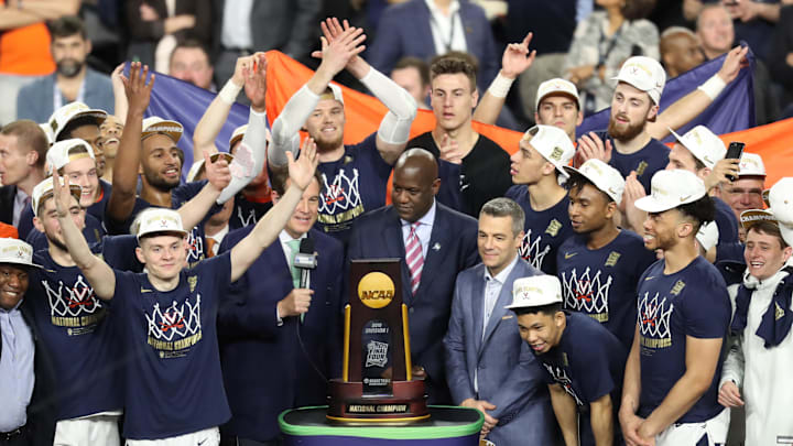 Apr 8, 2019; Minneapolis, MN, USA; Virginia Cavaliers players and head coach Tony Bennett celebrate on the podium with the national championship trophy after defeating the Texas Tech Red Raiders in the championship game of the 2019 men's Final Four at US Bank Stadium. Mandatory Credit: Brace Hemmelgarn-Imagn Images
Virginia celebrates the first national championship in school history.
2019-04-08 Virginia4 Apr 8, 2019; Minneapolis, MN, USA; Virginia Cavaliers players and head coach Tony Bennett celebrate on the podium with the national championship trophy after defeating the Texas Tech Red Raiders in the championship game of the 2019 men's Final Four at US Bank Stadium. Mandatory Credit: Brace Hemmelgarn-Imagn Images
Virginia celebrates the first national championship in school history.
2019-04-08 Virginia4