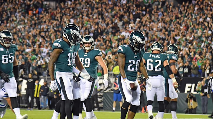 Philadelphia Eagles running back Miles Sanders celebrates his touchdown score with his teammates.