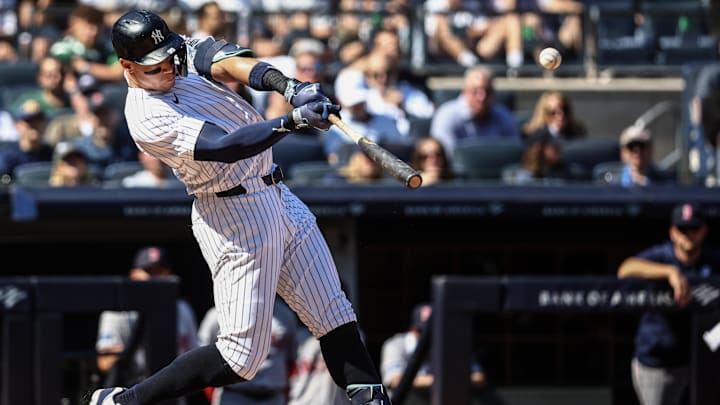 Sep 15, 2024; Bronx, New York, USA;  New York Yankees center fielder Aaron Judge (99) hits a two-run home run in the third inning against the Boston Red Sox at Yankee Stadium. Mandatory Credit: Wendell Cruz-Imagn Images