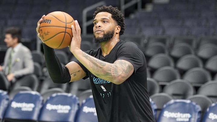Jan 31, 2025; Charlotte, North Carolina, USA; Charlotte Hornets forward Miles Bridges (0) shoots during pregame warm ups against the LA Clippers at Spectrum Center. Mandatory Credit: Jim Dedmon-Imagn Images Jan 31, 2025; Charlotte, North Carolina, USA; Charlotte Hornets forward Miles Bridges (0) shoots during pregame warm ups against the LA Clippers at Spectrum Center. Mandatory Credit: Jim Dedmon-Imagn Images