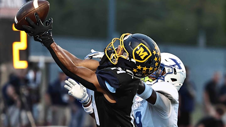 Moeller wide receiver catches a touchdown during their football game against St. Xavier Friday, Sept. 19, 2025.