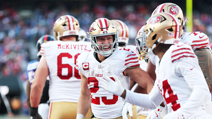 San Francisco 49ers running back Christian McCaffrey celebrates a touchdown with teammates against the New York Giants