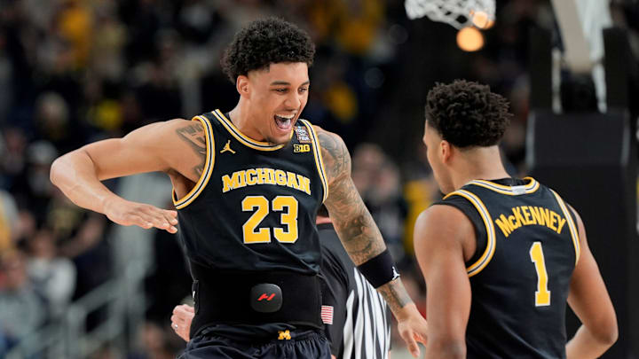 Michigan forward Yaxel Lendeborg (23) celebrates a play with Michigan guard Trey McKenney (1) in the first half of their Final Four game at Lucas Oil Stadium in Indianapolis on Saturday, April 4, 2026. Michigan forward Yaxel Lendeborg (23) celebrates a play with Michigan guard Trey McKenney (1) in the first half of their Final Four game at Lucas Oil Stadium in Indianapolis on Saturday, April 4, 2026.