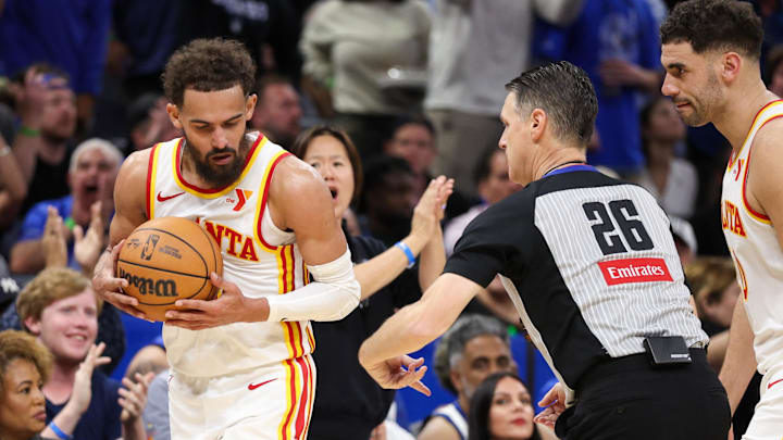 Apr 15, 2025; Orlando, Florida, USA; Atlanta Hawks guard Trae Young (11) reacts after receiving a second technical foul and ejection against the Orlando Magic in the fourth quarter at Kia Center.