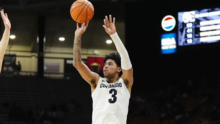 Feb 15, 2025; Boulder, Colorado, USA; Colorado Buffaloes guard Julian Hammond III (3) shoots a three point basket in the second half against the UCF Knights at the CU Events Center. Mandatory Credit: Ron Chenoy-Imagn Images