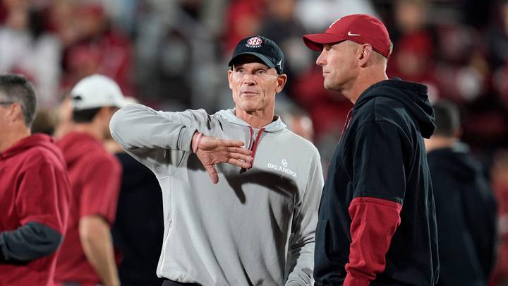 Oklahoma coach Brent Venables talks with Alabama coach Kalen DeBoer before a college football game. Oklahoma coach Brent Venables talks with Alabama coach Kalen DeBoer before a college football game.
