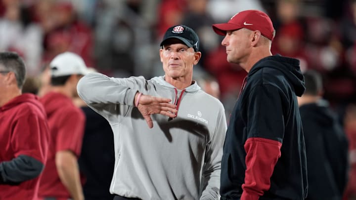 Oklahoma coach Brent Venables talks with Alabama coach Kalen DeBoer before a college football game between the University of Oklahoma Sooners (OU) and the Alabama Crimson Tide at Gaylord Family - Oklahoma Memorial Stadium in Norman, Okla., Saturday, Nov. 23, 2024. Oklahoma coach Brent Venables talks with Alabama coach Kalen DeBoer before a college football game between the University of Oklahoma Sooners (OU) and the Alabama Crimson Tide at Gaylord Family - Oklahoma Memorial Stadium in Norman, Okla., Saturday, Nov. 23, 2024.