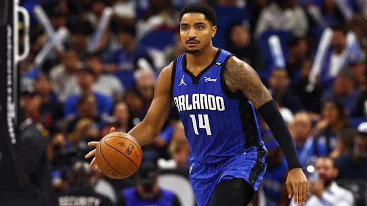 Orlando Magic guard Gary Harris (14) dribbles the ball against the Charlotte Hornets during the second half at Kia Center. Orlando Magic guard Gary Harris (14) dribbles the ball against the Charlotte Hornets during the second half at Kia Center.