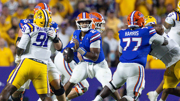 Sep 13, 2025; Baton Rouge, Louisiana, USA;  Florida Gators quarterback DJ Lagway (2) against LSU Tigers defensive tackle Walter Mathis Jr. (91) during the second half at Tiger Stadium. Mandatory Credit: Stephen Lew-Imagn Images