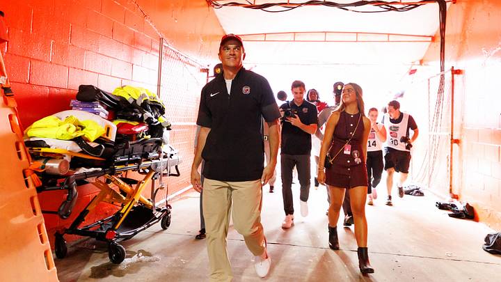 Oct 10, 2026; Gainesville, Florida, USA;  South Carolina Gamecocks head coach Shane Beamer and family smile while walking in the team tunnel after a game against the Florida Gators at Ben Hill Griffin Stadium.  Mandatory Credit: Matt Pendleton-Imagn Images