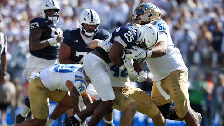 Oct 5, 2024; University Park, Pennsylvania, USA; Penn State Nittany Lions running back Quinton Martin Jr (25) runs with the ball on a return during the fourth quarter against the UCLA Bruins at Beaver Stadium. Mandatory Credit: Matthew O'Haren-Imagn Images Oct 5, 2024; University Park, Pennsylvania, USA; Penn State Nittany Lions running back Quinton Martin Jr (25) runs with the ball on a return during the fourth quarter against the UCLA Bruins at Beaver Stadium. Mandatory Credit: Matthew O'Haren-Imagn Images