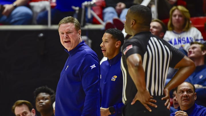 Feb 15, 2025; Salt Lake City, Utah, USA; Kansas Jayhawks head coach Bill Self argues with a referee after a call against the Utah Utes during the first half at the Jon M. Huntsman Center. Mandatory Credit: Christopher Creveling-Imagn Images