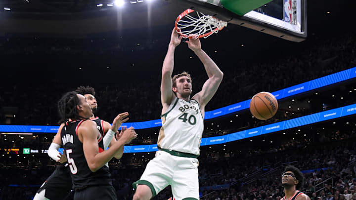 Apr 7, 2024; Boston, Massachusetts, USA; Boston Celtics center Luke Kornet (40) dunks the ball against the Portland Trail Blazers during the second half at TD Garden. Mandatory Credit: Eric Canha-Imagn Images Apr 7, 2024; Boston, Massachusetts, USA; Boston Celtics center Luke Kornet (40) dunks the ball against the Portland Trail Blazers during the second half at TD Garden. Mandatory Credit: Eric Canha-Imagn Images