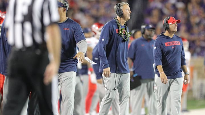 Arizona Wildcats head coach Brent Brennan watches his team during the second quarter of the game against Kansas State at Bill Snyder Family Stadium on Friday, September 13, 2024.
