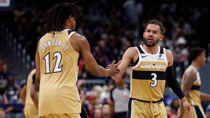 Mar 5, 2026; Washington, District of Columbia, USA; Washington Wizards guard Trae Young (3) celebrates with Wizards guard Tre Johnson (12) after a base against the Utah Jazz in the second half at Capital One Arena. Mandatory Credit: Geoff Burke-Imagn Images Mar 5, 2026; Washington, District of Columbia, USA; Washington Wizards guard Trae Young (3) celebrates with Wizards guard Tre Johnson (12) after a base against the Utah Jazz in the second half at Capital One Arena. Mandatory Credit: Geoff Burke-Imagn Images