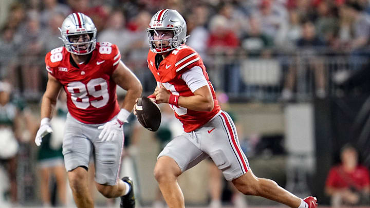 Ohio State Buckeyes quarterback Julian Sayin (10) scrambles in front of tight end Will Kacmarek (89) during the NCAA football game against the Ohio Bobcats at Ohio Stadium on Sept. 13, 2025. Ohio State won 37-9.