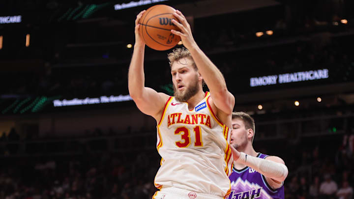 Feb 5, 2026; Atlanta, Georgia, USA; Atlanta Hawks center Jock Landale (31) grabs a rebound against the Utah Jazz in the third quarter at State Farm Arena. Mandatory Credit: Brett Davis-Imagn Images
