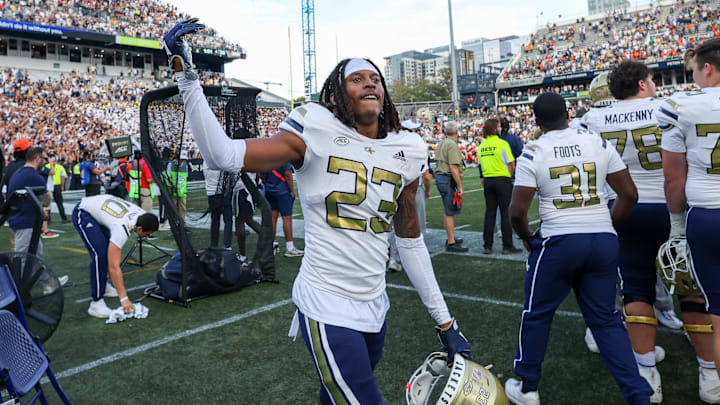 Nov 9, 2024; Atlanta, Georgia, USA; Georgia Tech Yellow Jackets defensive back Zachary Tobe (23) celebrates on the sideline against the Miami Hurricanes in the fourth quarter at Bobby Dodd Stadium at Hyundai Field. Mandatory Credit: Brett Davis-Imagn Images