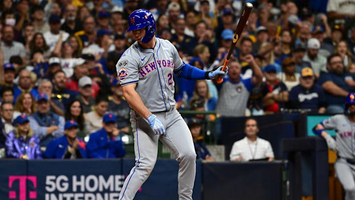 Oct 3, 2024; Milwaukee, Wisconsin, USA; New York Mets first baseman Pete Alonso (20) strikes out against the Milwaukee Brewers in the seventh inning during game three of the Wildcard round for the 2024 MLB Playoffs at American Family Field. Mandatory Credit: Benny Sieu-Imagn Images