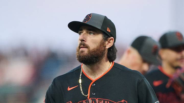 San Francisco, California, USA; San Francisco Giants pitcher Ryan Walker (74) walks to the dugout after a pitching change against the Pittsburgh Pirates during the sixth inning at Oracle Park. Mandatory Credit: Robert Edwards-Imagn Images