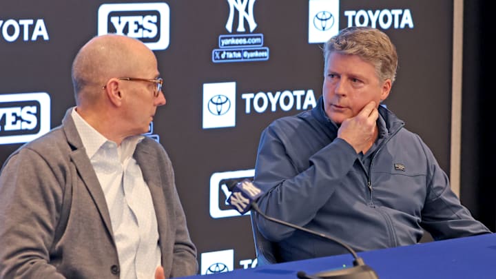 New York Yankees' Brian Cashman and Hal Steinbrenner...