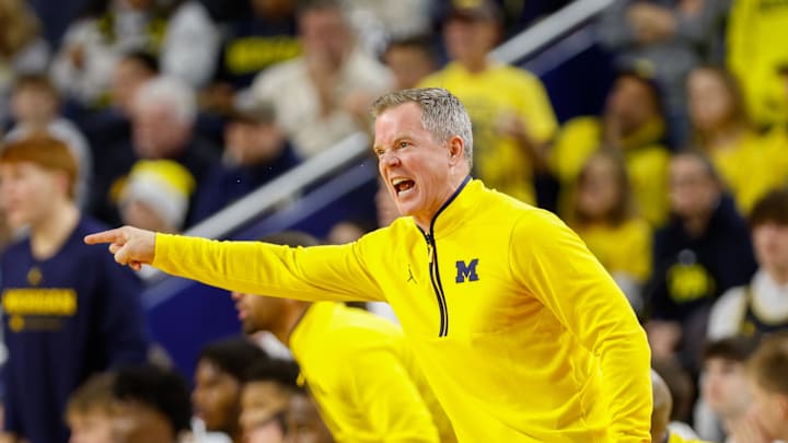 Dec 21, 2025; Ann Arbor, Michigan, USA; University of Michigan head coach Dusty May looks on from the sidelines during the first half against the La Salle Explorers at Crisler Center. Mandatory Credit: Brian Bradshaw Sevald-Imagn Images Dec 21, 2025; Ann Arbor, Michigan, USA; University of Michigan head coach Dusty May looks on from the sidelines during the first half against the La Salle Explorers at Crisler Center. Mandatory Credit: Brian Bradshaw Sevald-Imagn Images