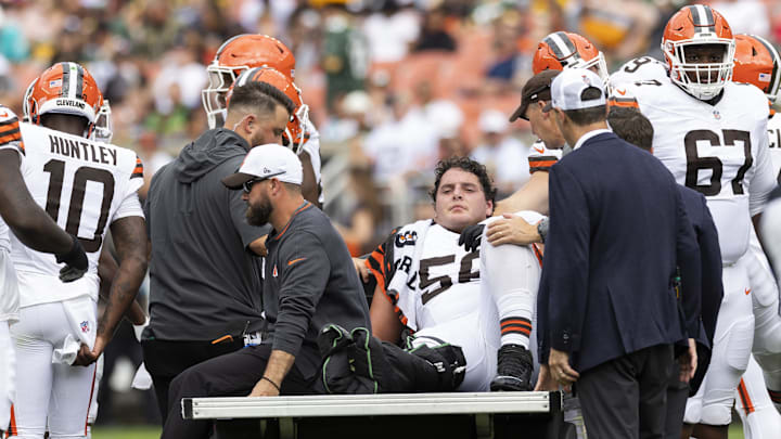 Aug 10, 2024; Cleveland, Ohio, USA; Cleveland Browns center Luke Wypler (56) rides the medical cart back to the locker room following an injury during the second quarter against the Green Bay Packers at Cleveland Browns Stadium. Mandatory Credit: Scott Galvin-USA TODAY Sports