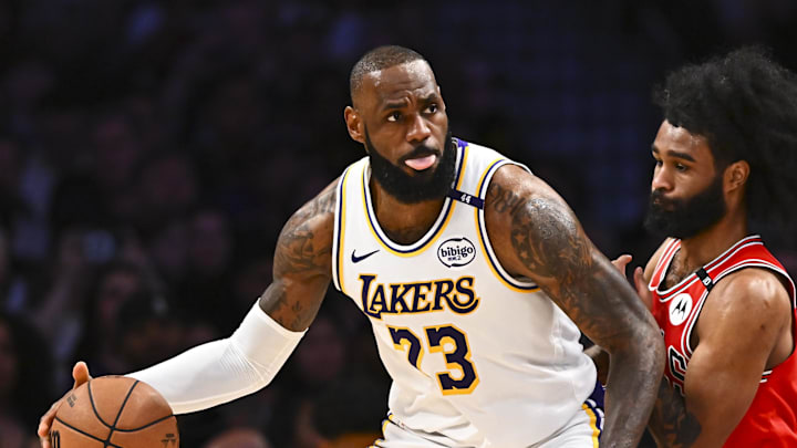 Mar 22, 2025; Los Angeles, California, USA; Los Angeles Lakers forward LeBron James (23) looks to pass against Chicago Bulls guard Coby White (0) during the second half at Crypto.com Arena. Mandatory Credit: Jonathan Hui-Imagn Images Mar 22, 2025; Los Angeles, California, USA; Los Angeles Lakers forward LeBron James (23) looks to pass against Chicago Bulls guard Coby White (0) during the second half at Crypto.com Arena. Mandatory Credit: Jonathan Hui-Imagn Images