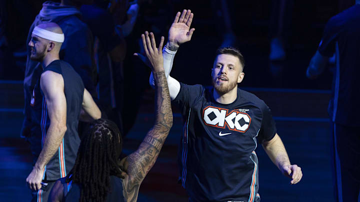 Nov 19, 2025; Oklahoma City, Oklahoma, USA; Oklahoma City Thunder center Isaiah Hartenstein (55) high fives his team during introductions before the start of a game against Sacramento Kings during the first quarter at Paycom Center. Mandatory Credit: Alonzo Adams-Imagn Images
