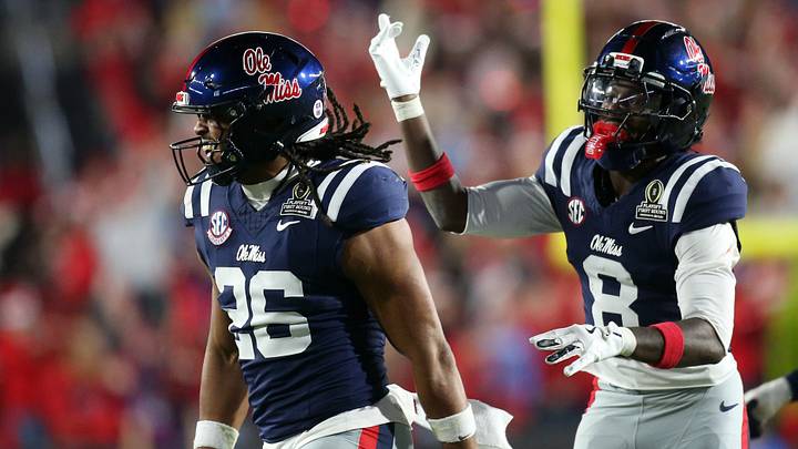 Dec 20, 2025; Oxford, MS, USA; Mississippi Rebels linebacker Tahj Chambers (26) and defensive back Antonio Kite (8) react during the fourth quarter against the Tulane Green Wave at Vaught-Hemingway Stadium. Mandatory Credit: Petre Thomas-Imagn Images Dec 20, 2025; Oxford, MS, USA; Mississippi Rebels linebacker Tahj Chambers (26) and defensive back Antonio Kite (8) react during the fourth quarter against the Tulane Green Wave at Vaught-Hemingway Stadium. Mandatory Credit: Petre Thomas-Imagn Images