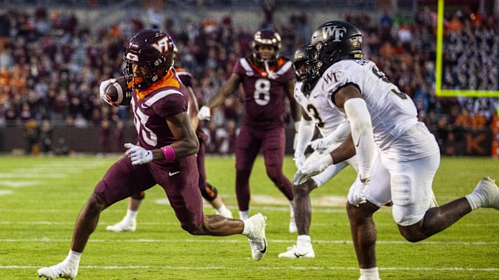 Oct 14, 2023; Blacksburg, Virginia, USA; Virginia Tech Hokies wide receiver Jaylin Lane (83) scores