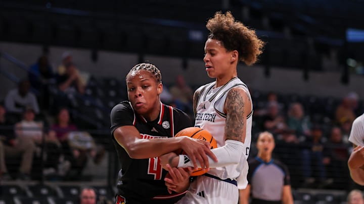 Feb 26, 2026; Atlanta, Georgia, USA; Louisville Cardinals forward MacKenly Randolph (4) and Georgia Tech Yellow Jackets guard Brianna Turnage (0) fight for a rebound in the first quarter at McCamish Pavilion. Mandatory Credit: Brett Davis-Imagn Images Feb 26, 2026; Atlanta, Georgia, USA; Louisville Cardinals forward MacKenly Randolph (4) and Georgia Tech Yellow Jackets guard Brianna Turnage (0) fight for a rebound in the first quarter at McCamish Pavilion. Mandatory Credit: Brett Davis-Imagn Images